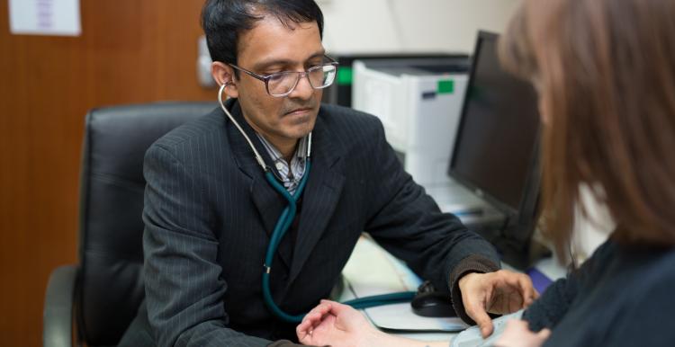 GP and patient in consultation room