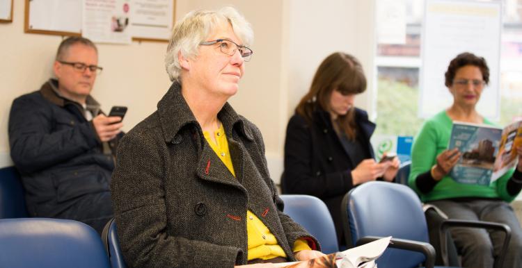 People sat in a waiting room