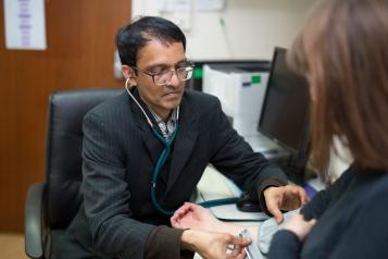 GP and patient in consultation room